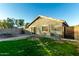 Backyard with patio, grass, and trampoline at 22789 W Cantilever St, Buckeye, AZ 85326