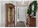 Entryway with wood display cabinet and dresser at 24230 S Desert Vale Dr, Sun Lakes, AZ 85248