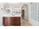 Double vanity bathroom with walk-in closet access at 2705 W Wildwood Dr, Phoenix, AZ 85045