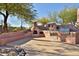 Outdoor kitchen with grill and fireplace at 29228 N 70Th Way, Scottsdale, AZ 85266