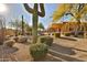 Landscaped backyard with a pool and desert landscaping at 29228 N 70Th Way, Scottsdale, AZ 85266