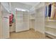 Spacious walk-in closet with ample shelving and hanging space at 29228 N 70Th Way, Scottsdale, AZ 85266