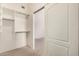 Spacious closet with built-in shelving and rods at 3022 S Lobo Cyn, Mesa, AZ 85212