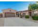 Two-story home with a two-car garage and landscaped yard at 3205 E Gemini Ct, Chandler, AZ 85249