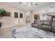 Open living room with french doors leading to kitchen area at 3205 E Gemini Ct, Chandler, AZ 85249