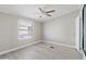 Spacious bedroom with ceiling fan and wood-look floors at 3330 E Main St # 111, Mesa, AZ 85213