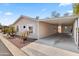 Covered carport with concrete flooring attached to the mobile home at 3330 E Main St # 111, Mesa, AZ 85213