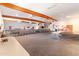 Spacious community room, ideal for gatherings, with long tables and chairs at 3330 E Main St # 111, Mesa, AZ 85213