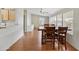 Bright dining area with wood floors and view into kitchen at 3330 E Main St # 111, Mesa, AZ 85213