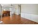 Simple dining area with table, chairs, and hardwood floors at 3330 E Main St # 111, Mesa, AZ 85213