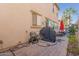 Backyard patio with a grill and seating area at 3702 E Dogwood Dr, Chandler, AZ 85286