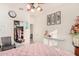 Bedroom with a queen bed, closet, and an ironing board at 3702 E Dogwood Dr, Chandler, AZ 85286