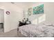 Bedroom with a queen-size bed and built-in desk area at 3702 E Dogwood Dr, Chandler, AZ 85286
