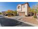 Two-story house with attached garage and landscaped yard at 3702 E Dogwood Dr, Chandler, AZ 85286