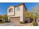 Two-story house with attached garage and front yard at 3702 E Dogwood Dr, Chandler, AZ 85286