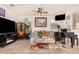 Living room with sofa, piano, and large artwork at 3702 E Dogwood Dr, Chandler, AZ 85286