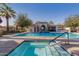 Community pool and spa with a relaxing patio area at 3702 E Dogwood Dr, Chandler, AZ 85286