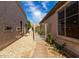 Pathway leads to a private backyard with gate access at 4106 E Mia Ln, Gilbert, AZ 85298