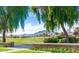 Scenic view of a lush golf course and mountains at 4106 E Mia Ln, Gilbert, AZ 85298