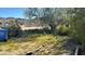 Front yard with desert landscaping, rocks and a blue recycling bin at 412 W Siesta Way, Phoenix, AZ 85041