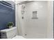 Clean bathroom with a shower and white tile at 5520 N 5Th Ln, Phoenix, AZ 85013