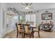 Bright dining area with wood table and chairs, and a large window at 6441 S Granite Dr, Chandler, AZ 85249