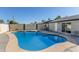 Relaxing kidney-shaped pool and spa in the backyard at 7272 W College Dr, Phoenix, AZ 85033