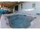 Relaxing hot tub on patio with covered seating area at 10443 W Butler Dr, Peoria, AZ 85345