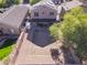 Aerial view highlighting the house's backyard and covered patio at 10856 E Arcadia Ave, Mesa, AZ 85208