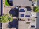 Aerial view of the house highlighting solar panels on the roof at 10856 E Arcadia Ave, Mesa, AZ 85208