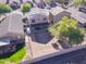 Aerial view showcasing the house's backyard and a tree at 10856 E Arcadia Ave, Mesa, AZ 85208