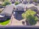 Aerial view of the house with a large backyard and solar panels at 10856 E Arcadia Ave, Mesa, AZ 85208
