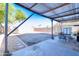 Covered patio and spacious backyard with storage shed at 10856 E Arcadia Ave, Mesa, AZ 85208