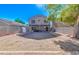 Large backyard with covered patio and mature tree at 10856 E Arcadia Ave, Mesa, AZ 85208