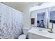 Bathroom with shower/tub combo and updated vanity at 10856 E Arcadia Ave, Mesa, AZ 85208