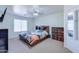 Spacious bedroom with a large bed and ample closet space at 10856 E Arcadia Ave, Mesa, AZ 85208