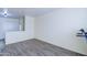 Spacious bedroom with wood-look floors and closet at 10856 E Arcadia Ave, Mesa, AZ 85208
