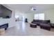 Living room includes a fireplace and a large TV at 10856 E Arcadia Ave, Mesa, AZ 85208