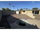 Backyard with brick patio and round spa at 1325 E Avalon Dr, Phoenix, AZ 85014