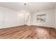 Bright living room with hardwood floors and neutral walls at 13737 W Luke Ave, Litchfield Park, AZ 85340