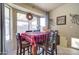 Cozy dining area with a red and black checkered tablecloth at 2421 E Dragoon Ave, Mesa, AZ 85204