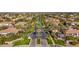 Aerial view of community entrance and surrounding homes at 3331 E Indigo Cir, Mesa, AZ 85213