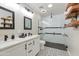 Modern bathroom with double vanity, large shower, and stylish tile at 4035 E Indianola Ave, Phoenix, AZ 85018