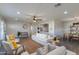 Open concept living room with modern furnishings and kitchen views at 4035 E Indianola Ave, Phoenix, AZ 85018
