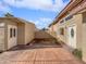 Small backyard with a storage shed and paved patio at 408 E Hidalgo Ave, Phoenix, AZ 85040