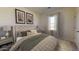 Bedroom with a queen-size bed, nightstands and neutral decor at 47688 W Cansados Rd, Maricopa, AZ 85139