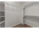 Spacious closet with shelving and hanging rods at 8371 W Pontiac Dr, Peoria, AZ 85382