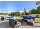 Comfortable patio furniture with a sectional sofa and a coffee table at 11209 N 45Th Way, Phoenix, AZ 85028