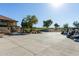 Golf clubhouse with golf carts and clock tower at 12510 W Tonto St, Avondale, AZ 85323