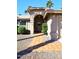 Front entryway with tiled walkway and arched entry door at 13854 N Fountain Hills Blvd, Fountain Hills, AZ 85268